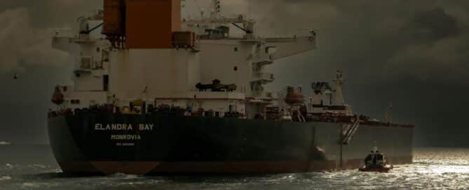 EAR99-classified impact recorder installed on heavy equipment shipment for export compliance monitoring